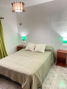 En eller flere senge i et værelse på Abdulle Complejo Turistico Centro + 84 billeder