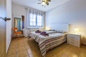 Giường trong phòng chung tại Apartamento Olivia Cotillo Country El Cotillo