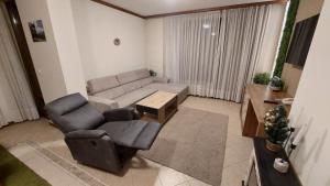 Posezení v ubytování Free SPA в Св. Иван Рилски - Сладък дом сред лукс