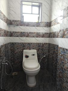 Vonios kambarys apgyvendinimo įstaigoje Hotel Ankit Palace