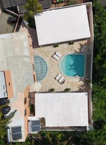 an overhead view of a swimming pool and resort at Together Boutique Villa in Ahangama