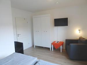 Et tv og/eller underholdning på Ferienwohnung Borkna