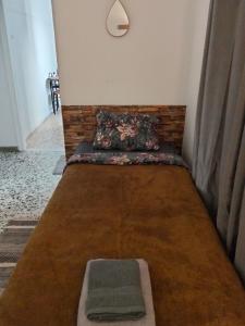 En eller flere senge i et værelse på SUNRISE near the sea apartment