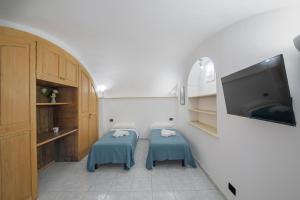 TV/trung tâm giải trí tại Casa Il Riccio