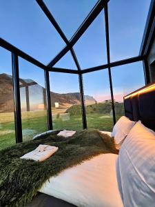 Postel nebo postele na pokoji v ubytování Sky Retreat Iceland