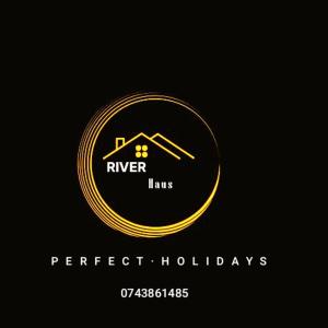 een gouden logo voor een huis op een zwarte achtergrond bij River Haus 