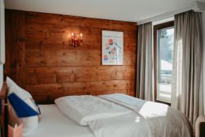 Giường trong phòng chung tại Ferienwohnungen ECKART, GABRIELHAUS