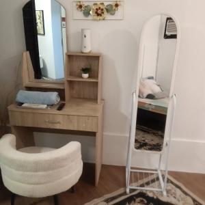 a dressing room with a mirror and a desk at Love Bk Siargao Homestay in General Luna