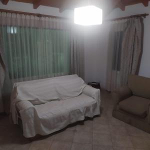 En eller flere senge i et værelse på Cafran