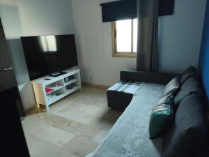 TV a/nebo společenská místnost v ubytování el refugio tranquilo