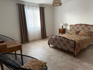 Postel nebo postele na pokoji v ubytování Appartement tout confort aux portes du Sancy