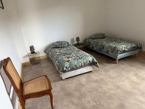 Postel nebo postele na pokoji v ubytování Appartement tout confort aux portes du Sancy