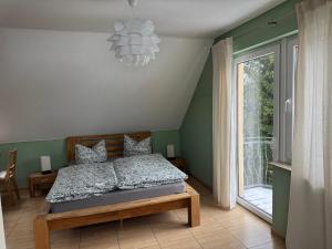 Postel nebo postele na pokoji v ubytování Magdalena Apartment 2