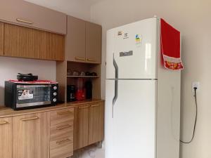 Nhà bếp/bếp nhỏ tại Casa ideal 6 quatros sendo 4 suítes 2 km do centro