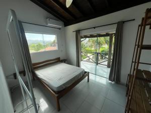 En eller flere senge i et værelse på Marina do Rosa + 47 billeder