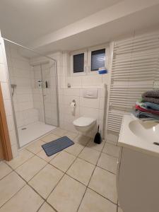 Koupelna v ubytování Komfortable Apartments Steger + 21 fotografií