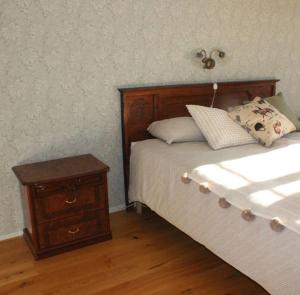 En eller flere senge i et værelse på Per Larsgård