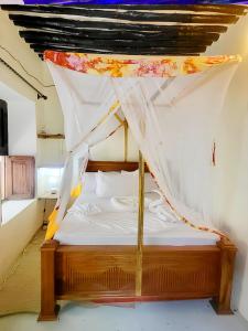 En eller flere senge i et værelse på Four Seasons