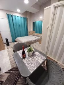 En eller flere senge i et værelse på Litsa Fit