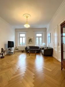 Et tv og/eller underholdning på Golf Apartment Villa Elisabeth