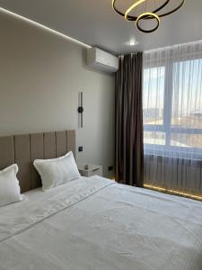 En eller flere senge i et værelse på 30# Galileo Terrace