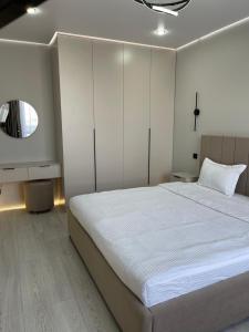 En eller flere senge i et værelse på 30# Galileo Terrace