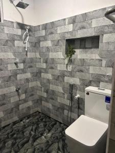 Phòng tắm tại AURORA Midigama