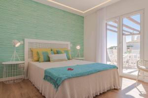 En eller flere senge i et værelse på Casa da Praia + 38 billeder