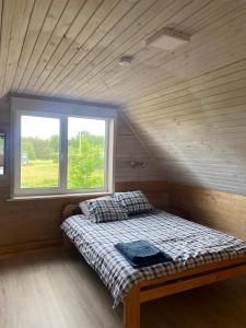 เตียงในห้องที่ Vesilinnu