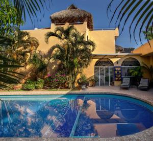 Swimmingpoolen hos eller tæt på Hotel Zandoyo Bed & Breakfast