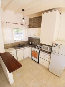 ครัวหรือมุมครัวของ Casa Parque Playa