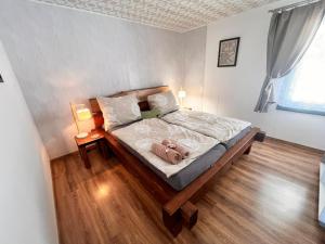 Postel nebo postele na pokoji v ubytování Chata POD HOUBOVÝM VRCHEM