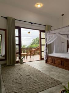 En eller flere senge i et værelse på Tangalle Bay Beach Villa