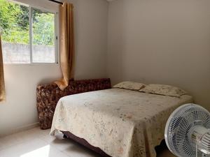 Giường trong phòng chung tại Casa ideal 6 quatros sendo 4 suítes 2 km do centro +26 ảnh