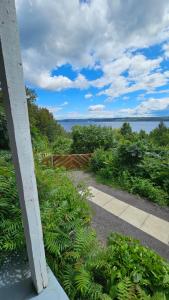 a view of the water from a house at Suite 3 Flèche du fjord vue Saguenay Mont Valin in Saint-Fulgence