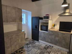 Køkken eller tekøkken på L'orée des 3 Rivières + 19 billeder