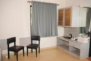 Køkken eller tekøkken på Coffee Gudda Resort