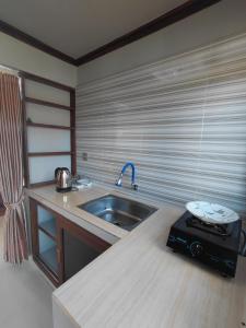 Kuchyň nebo kuchyňský kout v ubytování Sembalun agro villa&restoran