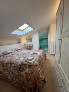 En eller flere senge i et værelse på L'Attico