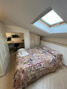 En eller flere senge i et værelse på L'Attico