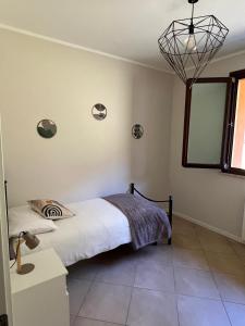 En eller flere senge i et værelse på Residenza degli Olivi