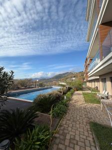 a view of a swimming pool in a building at Vivienne Apartment in Kavač