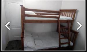 Giường trong phòng chung tại Good Dreams