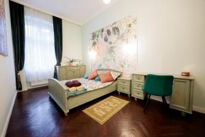 En eller flere senge i et værelse på Zakątek Żywiecki