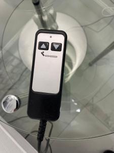 a cell phone sitting on top of a glass table at My Dream Space in Orange Park