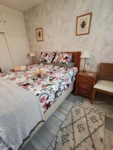 Giường trong phòng chung tại Марбея Citio Calahonda