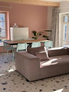 a living room with a couch and a table at Brezový dvor in Svätý Anton