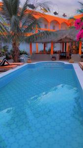 La alberca dentro o cerca de Hôtel évasion pêche djilor île sine saloum