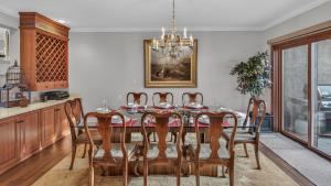 a dining room with a table and chairs at Chalet Premio in Beaver Creek