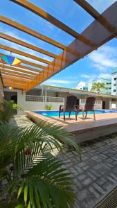 Hồ bơi trong/gần Aurora Peruíbe Hotel